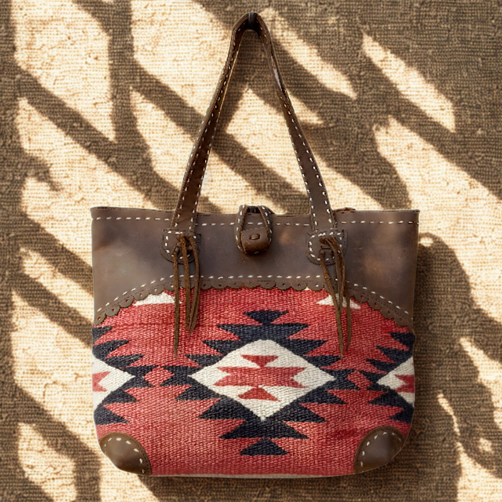 Handbag with a geometric pattern on a textured surface