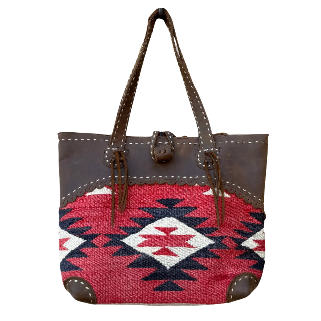 Tote bag with a red and blue geometric pattern on a white background