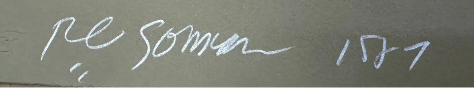 Signature and date on a gray background