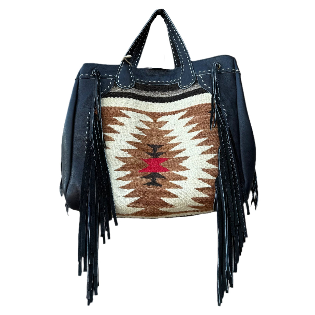 Handbag with black fringe and a patterned