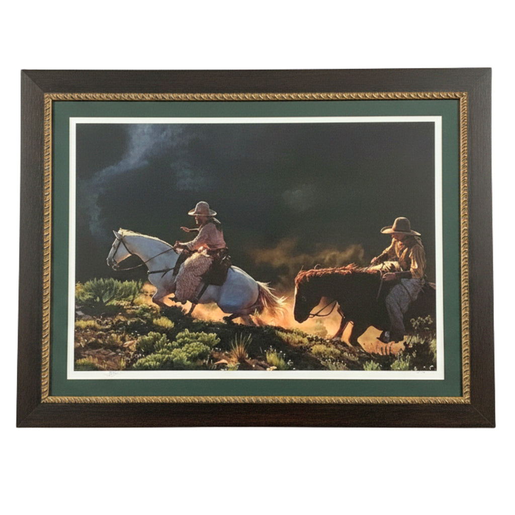Framed artwork of two cowboys on horseback in a natural setting.