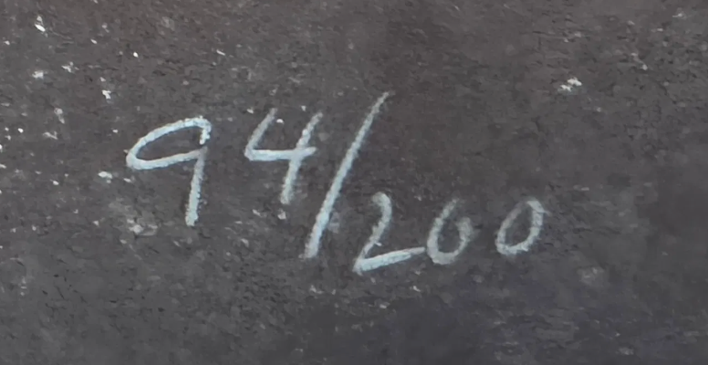 Text '94/200' written in white on a dark textured background